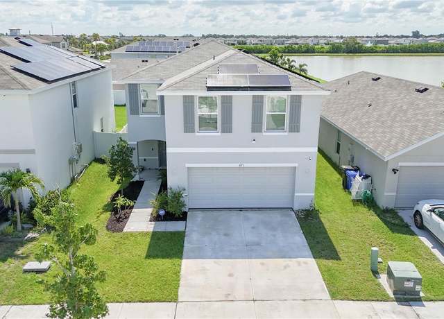 Property at 671 Sunlit Coral St, Ruskin, FL 33570, 4 beds, 2.5 baths