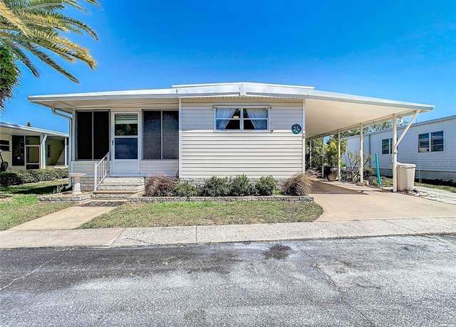 Property at 70 Thatch Palm St E, Largo, FL 33770, 2 beds, 2 baths