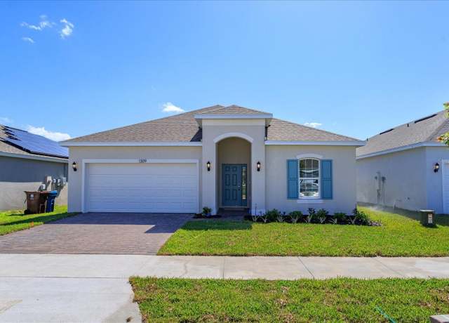 Property at 744 Sunshower Dr, Lady Lake, FL 32159, 4 beds, 2.5 baths