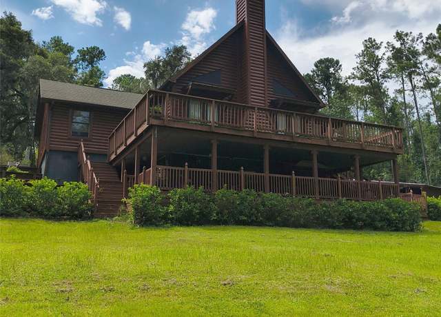 Property at 24050 Winding Creek Dr, Brooksville, FL 34601, 4 beds, 3 baths