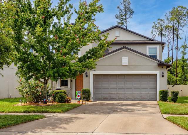 Property at 7034 Emerald Spring Loop, New Port Richey, FL 34653, 5 beds, 2.5 baths