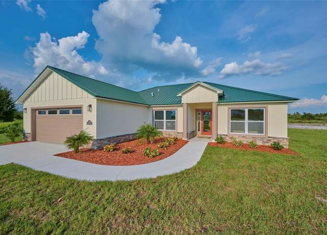 Property at 7031 Red Grange Boulevard Ave, Indian Lake Estates, FL 33855, 3 beds, 2 baths