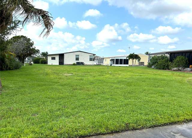 Property at 404 Tarde Logo Cir, North Port, FL 34287