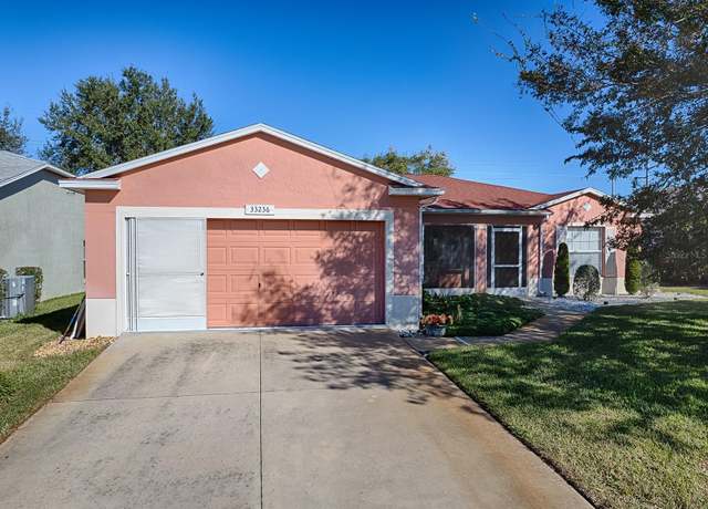 Property at 33236 Grand Cypress Way, Leesburg, FL 34748, 3 beds, 2 baths