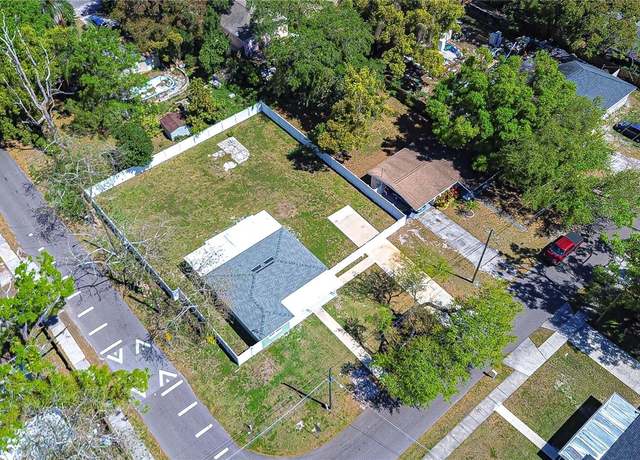 Property at 1702 E Frierson Ave, Tampa, FL 33610, 4 beds, 3 baths