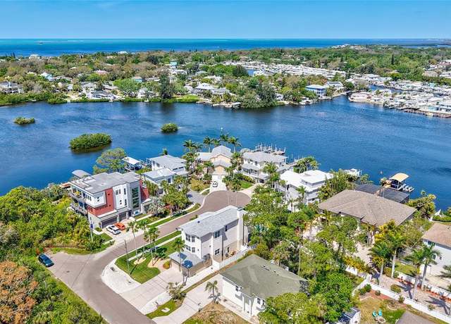 Property at 1700 Oyster Point Way, Palm Harbor, FL 34683, 4 beds, 3.5 baths