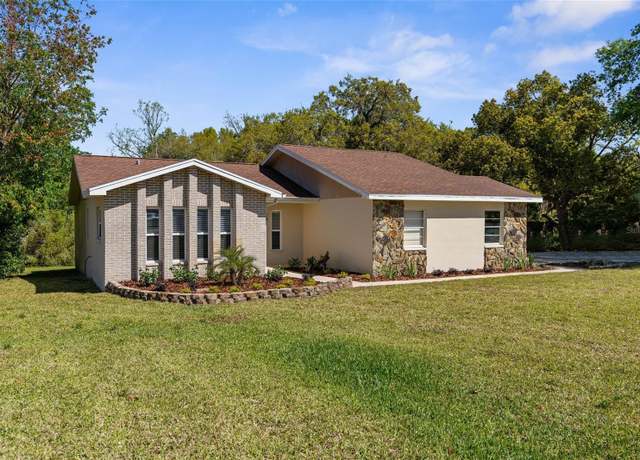 Property at 9545 Sunshine Blvd, New Port Richey, FL 34654, 4 beds, 2 baths