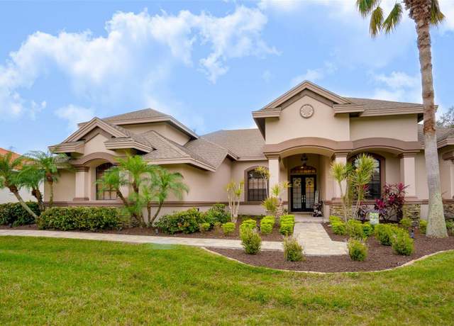 Property at 1655 Canopy Oaks Blvd, Palm Harbor, FL 34683, 5 beds, 3 baths