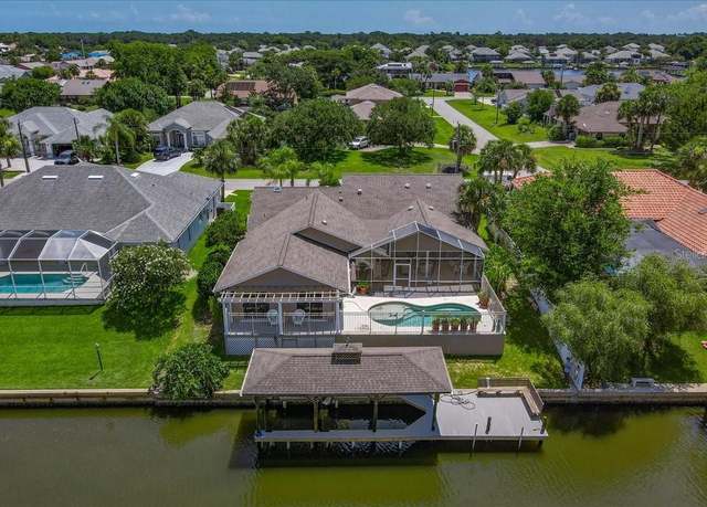 Property at 13 Cottagegate Ct, Palm Coast, FL 32137, 4 beds, 3 baths