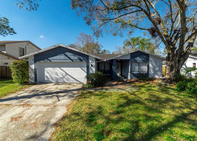Property at 15716 Country Lake Dr, Tampa, FL 33624, 3 beds, 2 baths