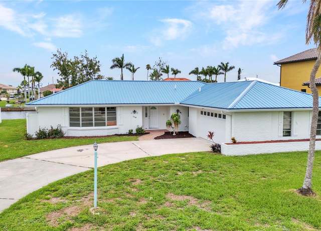 Property at 114 Sinclair St SE, Port Charlotte, FL 33952, 3 beds, 3 baths