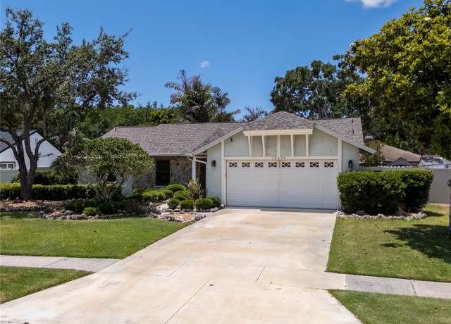 Property at 12506 Twisted Oak Dr, Tampa, FL 33624, 3 beds, 2 baths