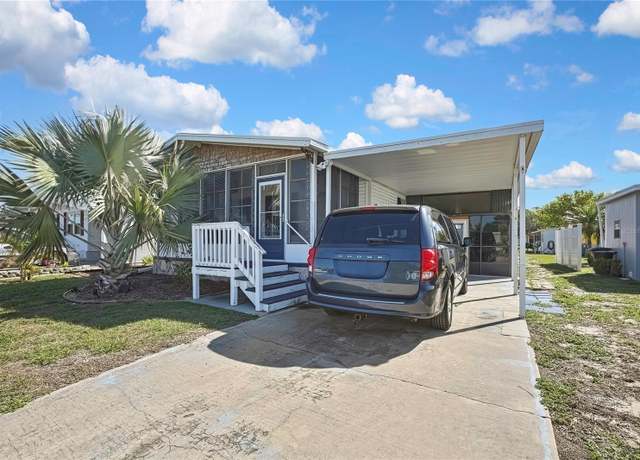 Property at 2400 Lemur Dr, Holiday, FL 34690, 4 beds, 2 baths
