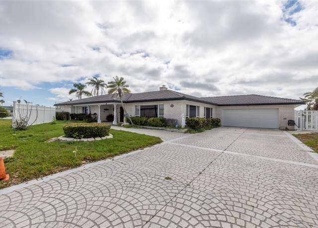 Property at 11620 6th St E, Treasure Island, FL 33706, 4 beds, 3 baths