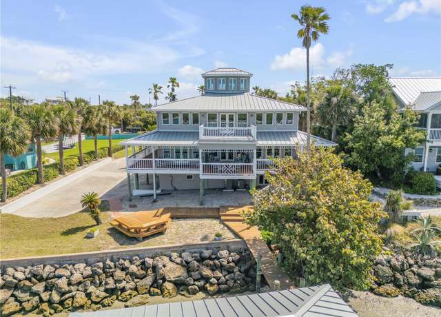 Property at 1110 N Peninsula Ave, New Smyrna Beach, FL 32169, 4 beds, 4 baths