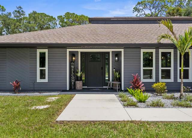 Property at 4060 Woodland Blvd, North Port, FL 34291, 3 beds, 3 baths