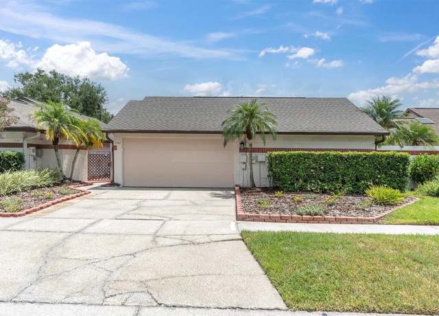 Property at 7104 Silvermill Dr, Tampa, FL 33635, 3 beds, 2 baths