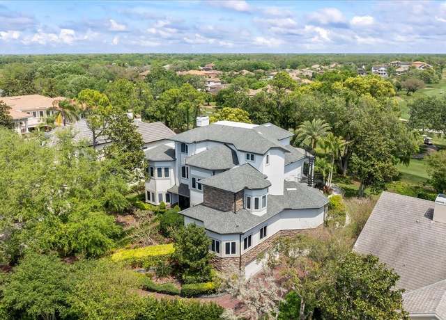 Property at 1058 Roundstone Pl, Palm Harbor, FL 34683, 5 beds, 7.5 baths