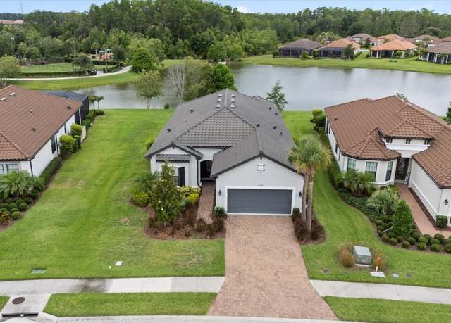 Property at 11398 Juglans Dr, Odessa, FL 33556, 3 beds, 3 baths