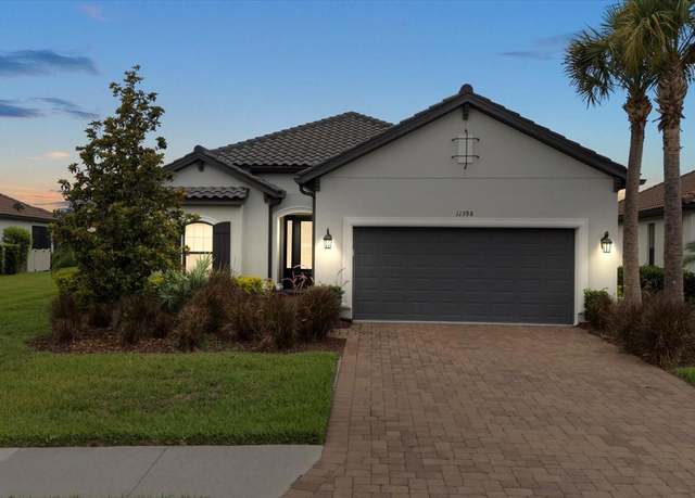 Property at 11398 Juglans Dr, Odessa, FL 33556, 3 beds, 3 baths