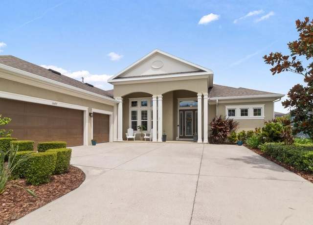 Property at 16697 Courtyard Loop, Land O Lakes, FL 34638, 4 beds, 3 baths