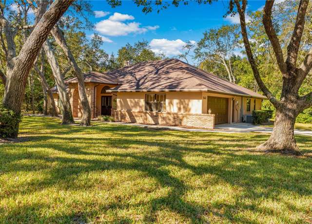 Property at 7443 Oak Tree Ln, Spring Hill, FL 34607, 3 beds, 2 baths