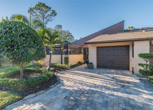 Property at 5010 Umber Way N, Tampa, FL 33624, 2 beds, 2.5 baths