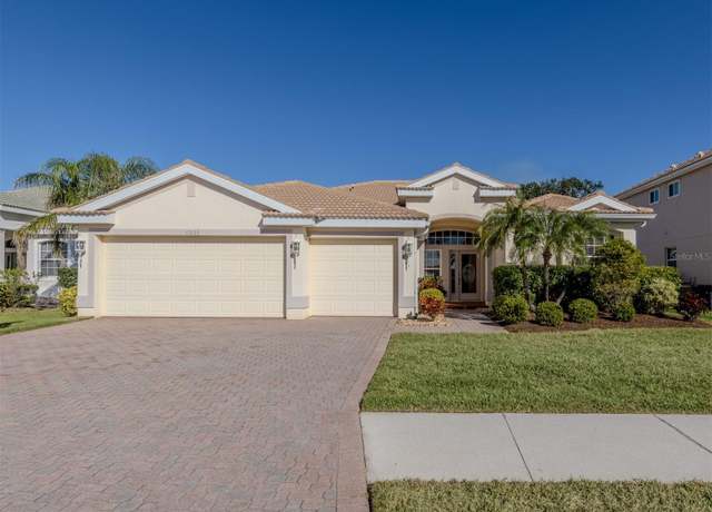 Property at 12022 Granite Woods Loop, Venice, FL 34292, 4 beds, 3 baths