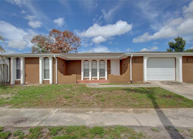 Property at 2105 Sugarbush Dr, Holiday, FL 34690, 3 beds, 2 baths