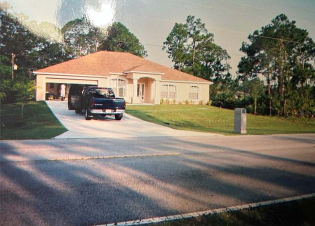 Property at 1580 Jupiter Blvd NW, Palm Bay, FL 32907, 4 beds, 3 baths