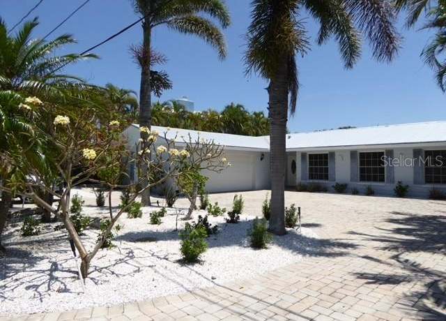 Property at 12055 4th St E, Treasure Island, FL 33706, 4 beds, 3 baths