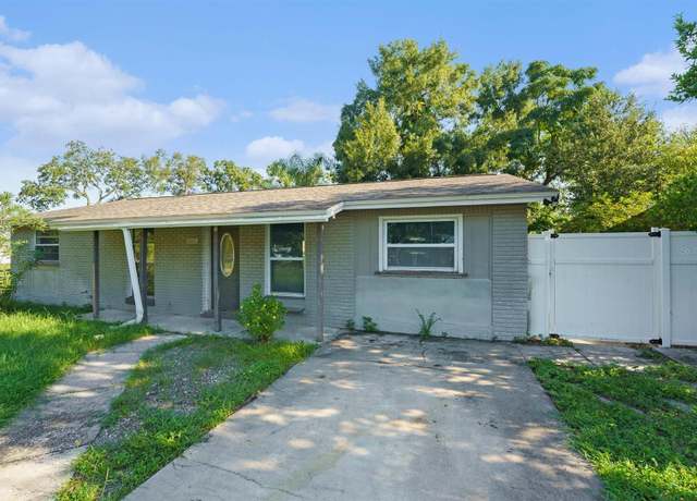 Property at 6515 Runningwoods Dr, Tampa, FL 33634, 3 beds, 2 baths