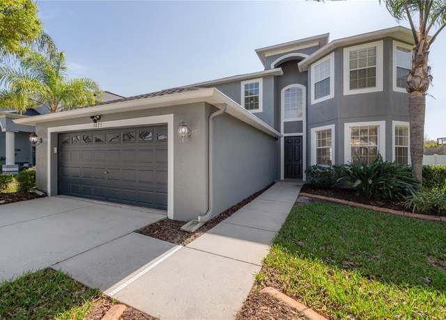 Property at 3025 Chessington Dr, Land O Lakes, FL 34638, 4 beds, 3 baths