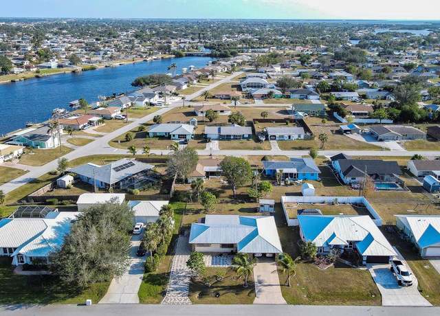 Property at 817 Linnaen Ter NW, Port Charlotte, FL 33948, 3 beds, 3 baths