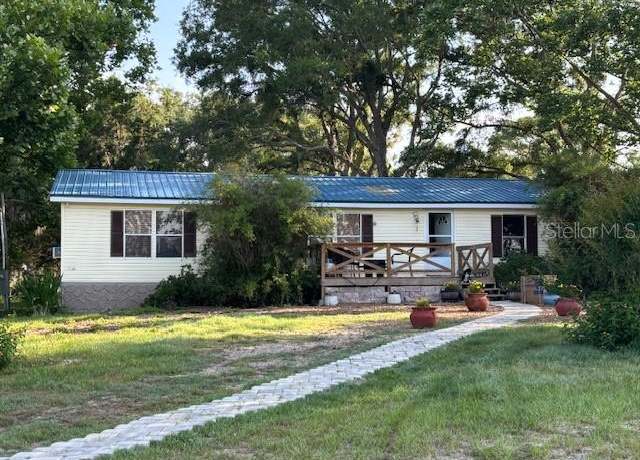 Property at 10050 NW 67th Pl, Chiefland, FL 32626, 4 beds, 2 baths