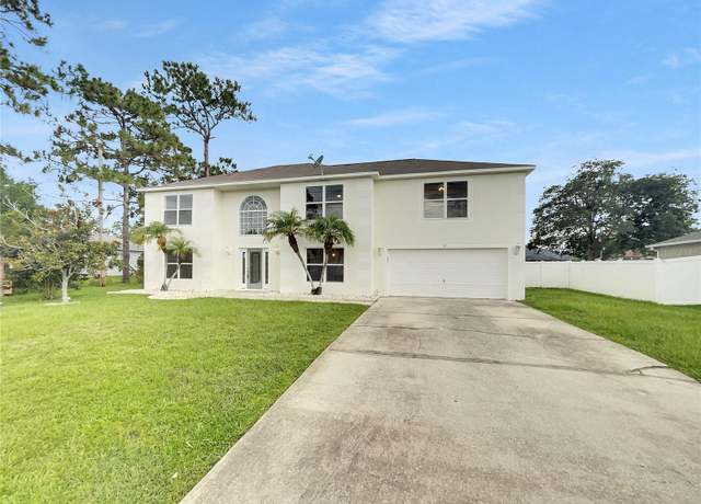 Property at 11 Ponce Deleon Dr, Palm Coast, FL 32164, 5 beds, 2.5 baths