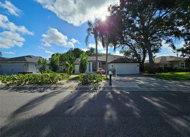 Property at 1638 Polo Club Dr, Tarpon Springs, FL 34689, 4 beds, 3 baths