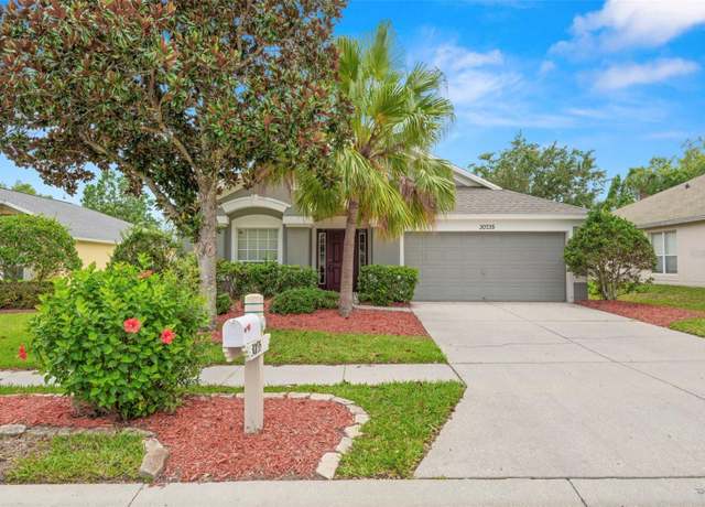 Property at 30735 Lanesborough Cir, Wesley Chapel, FL 33543, 4 beds, 2 baths