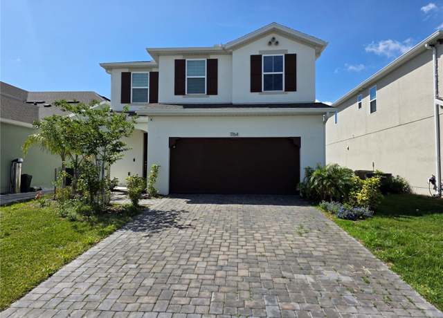 Property at 1764 Stamen Dr, Kissimmee, FL 34744, 4 beds, 2.5 baths