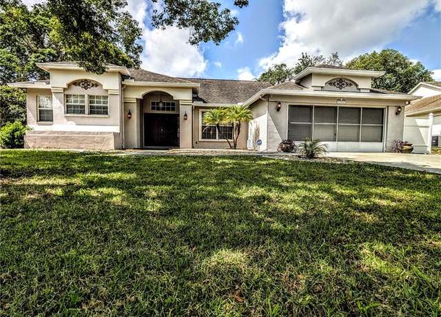 Property at 8088 Spanish Oak Dr, Spring Hill, FL 34606, 4 beds, 2 baths