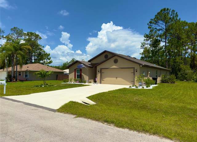 Property at 8 Slipper Flower Path E, Palm Coast, FL 32164, 5 beds, 3 baths