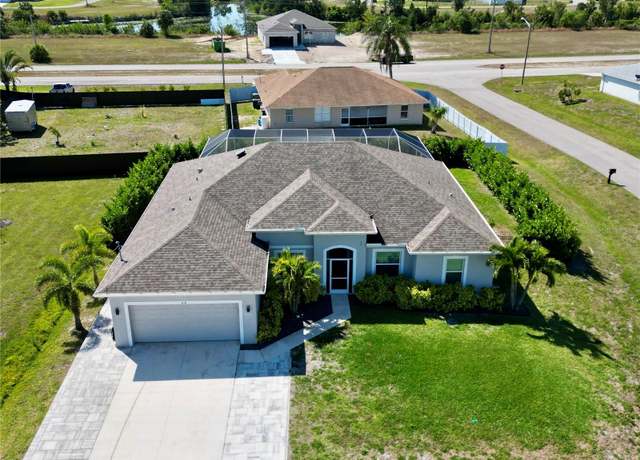 Property at 818 NE 38th St, Cape Coral, FL 33909, 4 beds, 3 baths