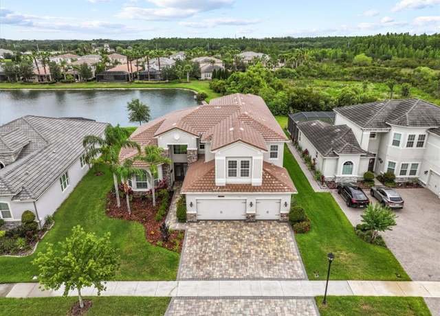 Property at 2724 Coco Palm Cir, Wesley Chapel, FL 33543, 5 beds, 7.5 baths