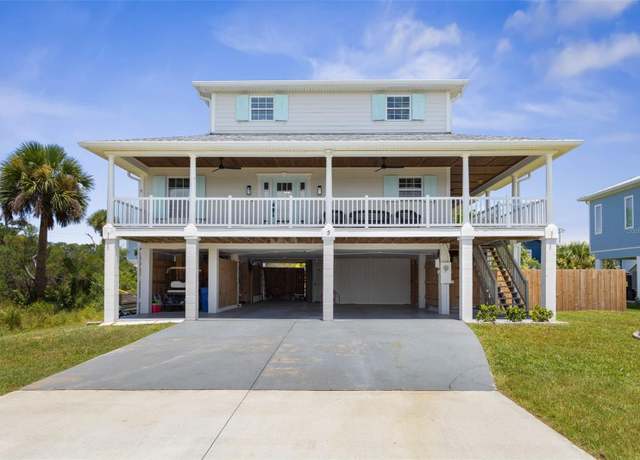 Property at 5 Rollins Dr, Palm Coast, FL 32137, 3 beds, 2.5 baths