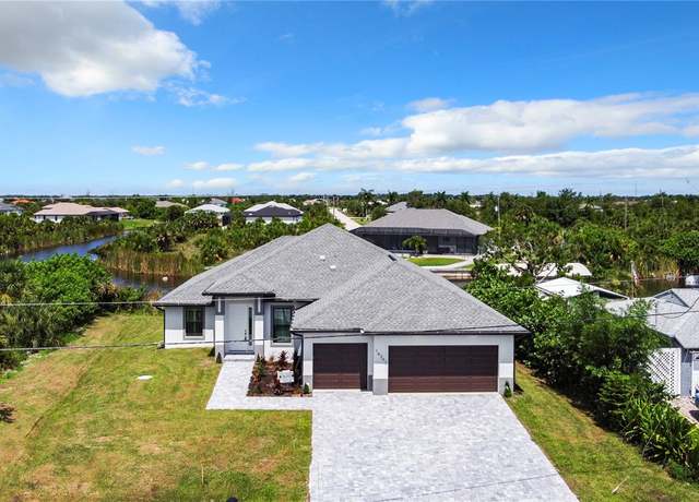 Property at 14267 Montmarte Ave, Port Charlotte, FL 33981, 4 beds, 2.5 baths