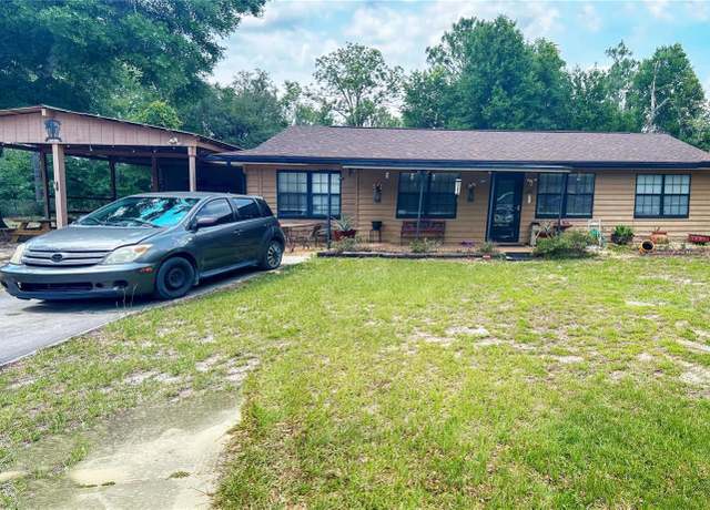 Property at 11451 NE 110th Ln, Archer, FL 32618, 2 beds, 2 baths
