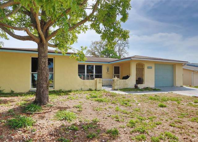 Property at 9836 Rainbow Ln, Port Richey, FL 34668, 4 beds, 2 baths