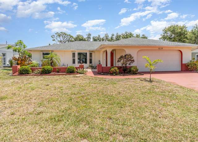 Property at 1839 Neptune Dr, Englewood, FL 34223, 4 beds, 3 baths