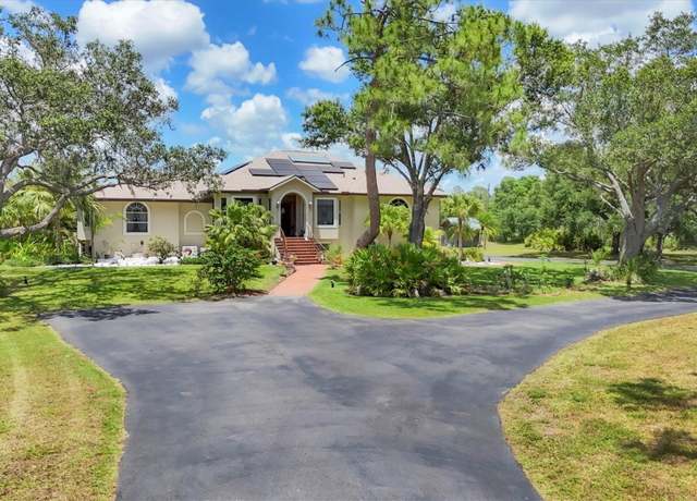 Property at 6242 Tropicaire Blvd, North Port, FL 34291, 4 beds, 3.5 baths