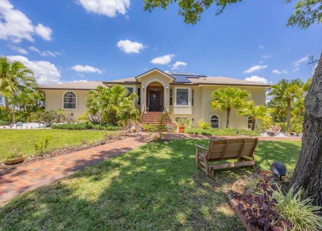 Property at 6242 Tropicaire Blvd, North Port, FL 34291, 4 beds, 3.5 baths